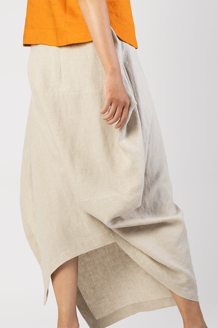 Tilt - Tilted long skirt with side slit