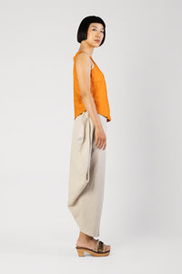 Tilt - Tilted long skirt with side slit