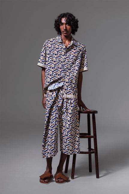 Unisex cotton Thai pants with block print, red stitching and waist belt detail, handmade in yarn-dyed fabric.