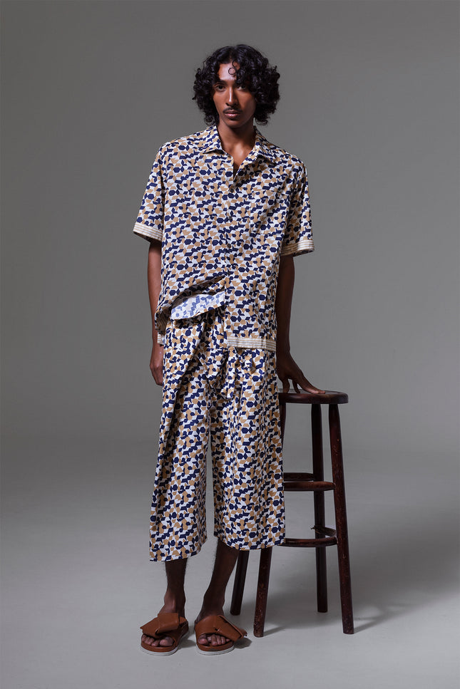 Unisex cotton Thai pants with block print, red stitching and waist belt detail, handmade in yarn-dyed fabric.