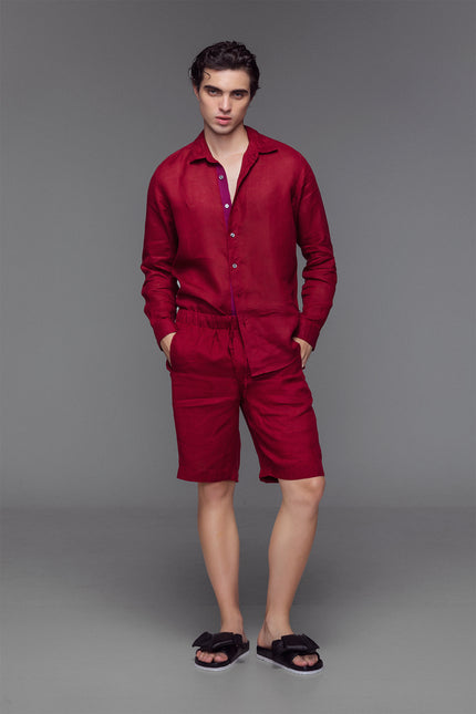 Model wearing Lugh Shorts in pure linen with elastic waistband and adjustable drawstrings that are effortlessly comfortable and timeless for resort or summer wear.