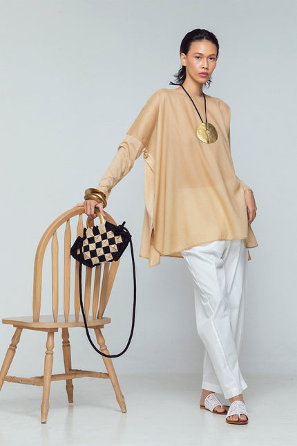 Nerium Mini Handbag with a sculptural hexagonal silhouette, origami-inspired textured cotton body, and handmade brass gold plate handle.