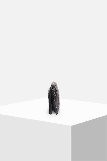 Liebe Clutch made from cotton with contrast croco appliqué and sequin embellishments, featuring a foldable design with detachable strap, zip closure, and inner patch pomet for versatile styling.